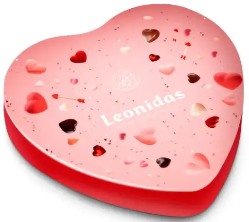 [Een selectie pralines van de (gouden) hand van onze Maîtres Chocolatiers, mooi verpakt in een metalen doos in hartvorm met 9 praliens.] Leonidas Valentijn Metalen Hart - 9 Bonbons